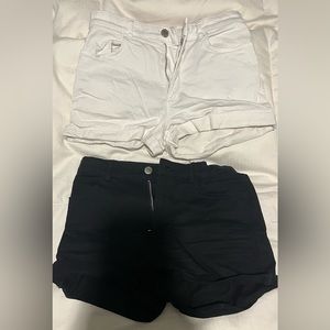 Two pairs of H&M Jean Shorts, white and black.